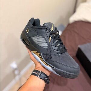 Black and Gold Air Jordan Sneakers